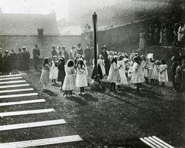 View of West Port Garden, girls dancing around maypole