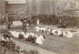 Group of children and women playing in White Hart Garden